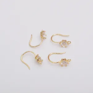 Close-up of 14k gold plated earring hooks with micro-inlaid cubic zirconia stones