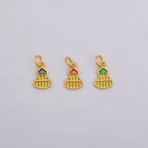 Detailed view of three mini gold abacus pendants with red, blue, and green enamel details