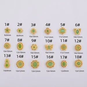 Golden clover and butterfly jewelry beads with green gemstones in various sizes