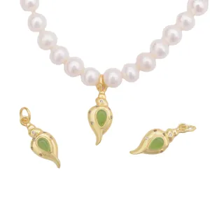 Classic gold conch pendant necklace with green gemstone and white pearl strand