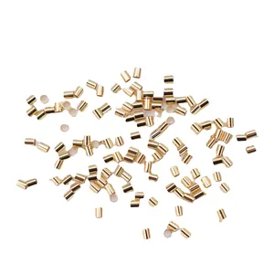 Bulk 14k gold filled crimp tube beads for DIY necklace and jewelry making on white background