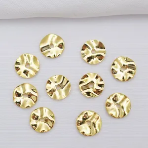 Détail de 10 perles intercalaires ondulées dorées pour la création de bijoux DIY baroques