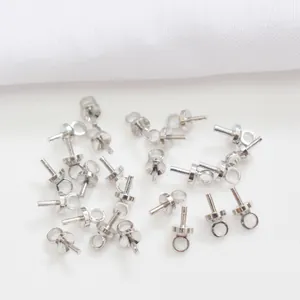 Macro shot of 14k gold-filled screw eye pins for DIY jewelry and half-hole beads