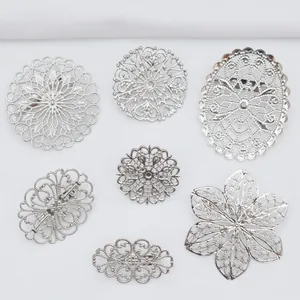 Lot de 7 plaques de base de broche filigrane argentées aux motifs floraux et géométriques