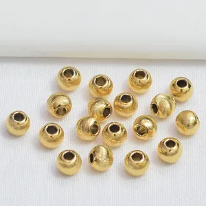 Perles rondes spirales plaquées or 24k pour bijoux DIY avec surface métallique texturée