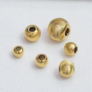 Macro de perles d'espacement rondes plaquées or 24k avec texture spirale pour bijoux