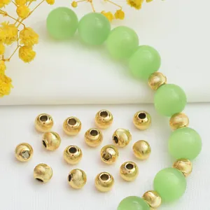 Perles dorées 24 carats à texture spirale et perles œil de chat pour bracelets DIY