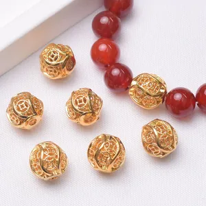 24k gold plated hollow coin spacer beads for DIY jewelry making with red agate accents