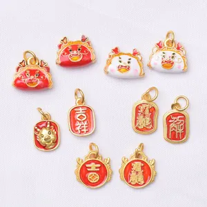 DIY dragon charms in ancient gold finish with Chinese auspicious characters on fabric