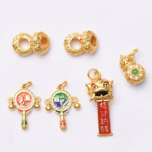 Traditional gold-tone dragon charms set with enamel lion dance and gourd pendants