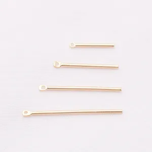 Detailed view of four assorted length 14k gold filled round bar earwire jewelry findings