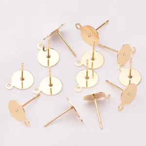 Detailed view of 18k gold plated earring studs with flat pad and hanging loop for DIY
