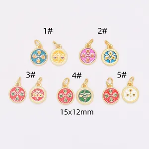 Set of 10 gold-plated enamel pendants featuring ethnic patterns in 15x12mm size