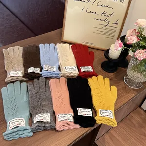 Lace knit fingerless gloves in ten colors with ruffled cuffs and thermal wool material