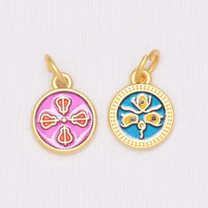 Macro shot of colorful enamel lotus charms and vajra pendants for DIY jewelry making