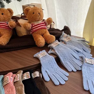 Lace openwork knit fingerless gloves with elegant wavy patterns in various soft colors