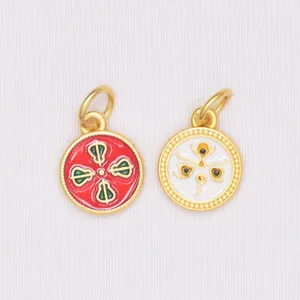 Detail of colorful enamel cloisonne charms with vajra and eye patterns for DIY jewelry