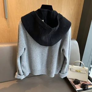Close-up of the contrast hood stitching and knit texture on the two-tone Balaclava