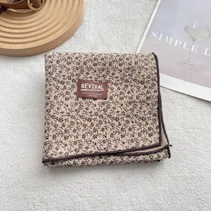 Vintage floral cotton long scarf in beige with black print and brown roll edge