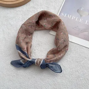 Retro floral cotton linen bandana in dusty pink with blue knot detailing on white fur