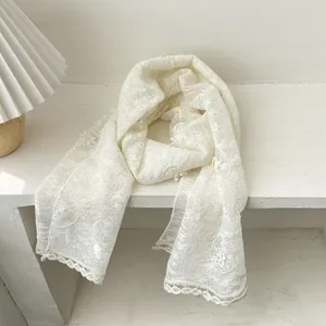 Elegant white lace scarf with vintage floral embroidery and scalloped edges
