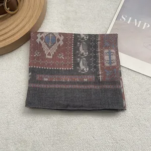 Detailed close-up of ethnic print cotton linen square scarf with tribal elephant patterns