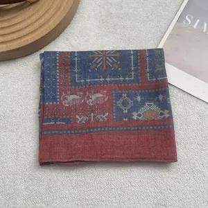 Close-up of bohemian cotton linen bandana with ethnic patterns on soft white faux fur