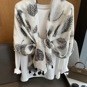 Lightweight black and white scarf with maple leaf print and fringe tassels for women