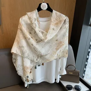 Floral cotton linen beach scarf shawl with green tassels and elegant botanical prints