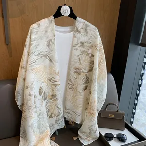 Elegant floral print cotton linen shawl with tassels for sun protection and beach wear