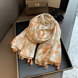 Châle à fleurs avec pompons orange et tissu léger respirant à imprimé floral