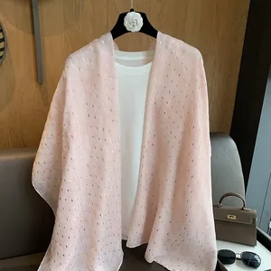 Light pink pleated summer scarf for women with shimmering gold threads and sheer texture