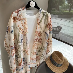 White cotton linen shawl with colorful coral and starfish print for beach sun protection