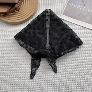 French style black lace triangle hair scarf with floral embroidery on wood stand