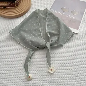 Green floral triangle scarf with white wavy edges and delicate knit flower charms