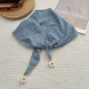 Blue floral cotton triangle scarf with crochet flower tassels and white wavy edges