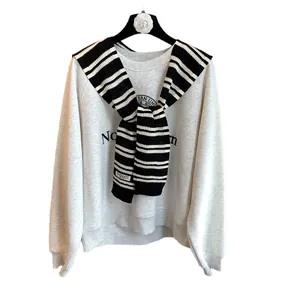 Women's grey sweatshirt with striped knitted shawl and collegiate graphic print