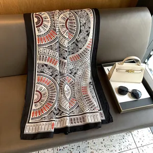 Detail of retro ethnic print scarf with tribal patterns on a leather bench setup