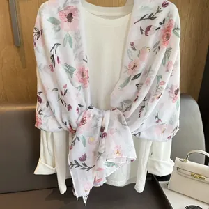 Pink floral print shawl with thin white summer scarf style for beach or sun protection