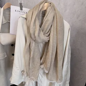 Linen lace scarf shawl in beige with floral crochet edges and a delicate bow detail