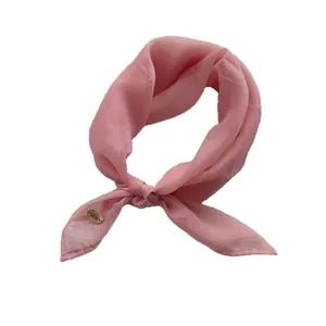 Elegant solid light pink faux silk square scarf with decorative gold metal buckle accessory