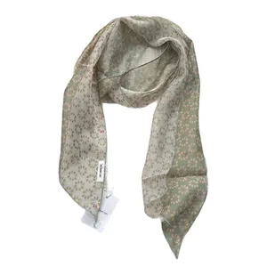 Chic two-tone long skinny silk scarf in light green and beige with dot flower print