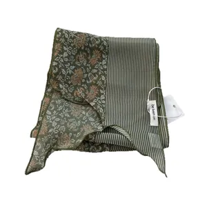 Olive green striped silk scarf with retro floral pattern and brand tag on white background