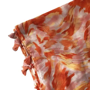 Lightweight cotton linen scarf with orange pink graffiti print and tassel details