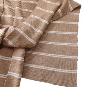 Classic striped knit shawl scarf for women in camel and white with soft drape texture