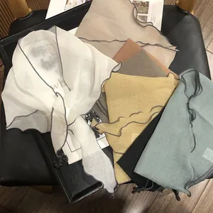 Translucent triangular silk scarf set with wavy edges in various Morandi colors