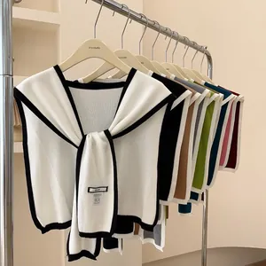 Knitted shawl wrap for women featuring classic contrast trim in various stylish colors