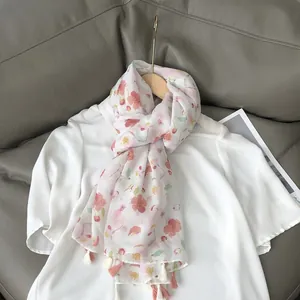 Women's floral print scarf with pink cherry blossoms and elegant dual-color tassels