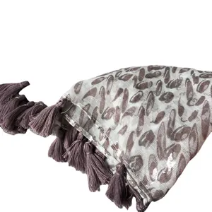 Ethnic animal print summer scarf shawl with gold accents and elegant tassel details