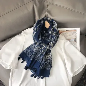 Navy blue paisley bali gauze scarf with white patterns and decorative tassels